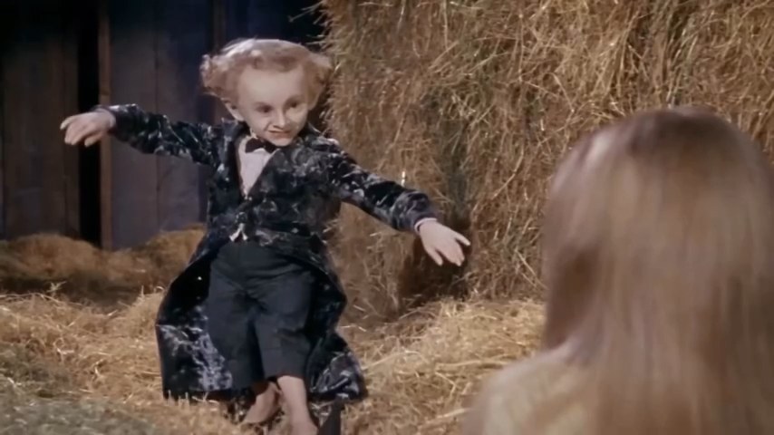 Dancer and surprised observer sharing the barn scene